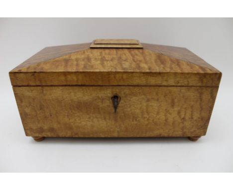 A 19th century maple veneer table casket, hinged cover with early paper lining, fitted decorative back plate ring drop handle