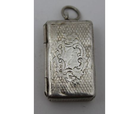 William Neal, a mid-19th century small vesta case of book opening form, gilded interior, striker along the hinge side chased 