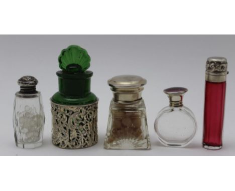 Henry Williamson Ltd. a glass scent bottle with silver and purple guilloche enamel screw cap, London 1924, 5cm high, together
