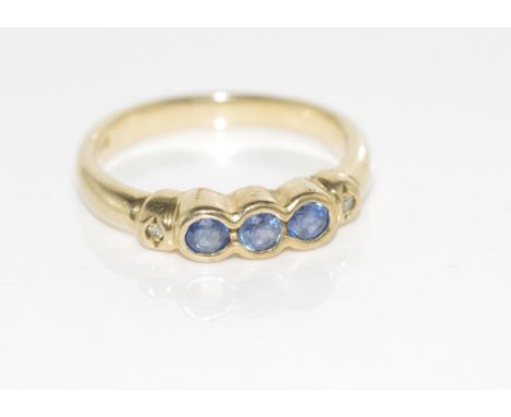 9ct yellow gold, sapphire and diamond ring weight: approx 2.85 grams, size: M-N/6