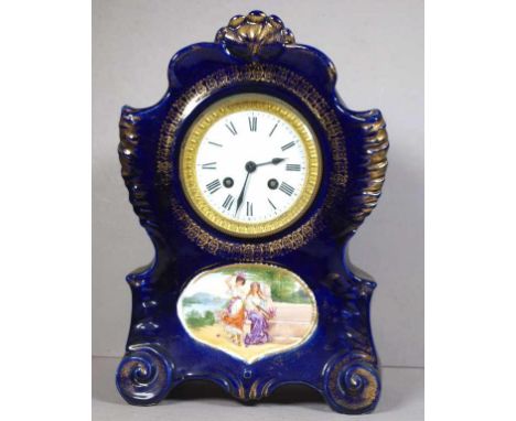 French L Marti et Cie mantle clock with striking movement, in ceramic case (cracked on back), 33cm high,with pendulum but no 