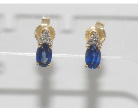 Delicate 14ct yellow gold, sapphire& diamond studs weight: approx 0.84 grams