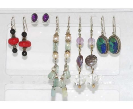 Five various pairs of earrings including silver together with a silver ring