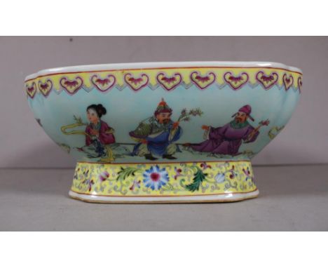 Chinese polychrome decorated ceramic bowl exterior decorated with figures in various activities, footed base, with character 