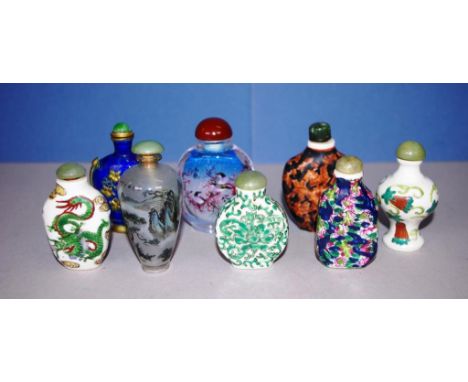 Collection eight various Chinese snuff bottles including 5 various ceramic and 3 various glass bottles. Each with a stopper.