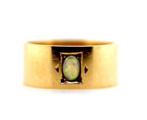 15ct yellow gold, opal set band outside engraved J.F., weight: approx 7.35 grams, size: S/9