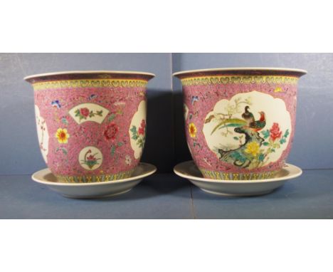 Pair Chinese ceramic jardinieres each decorated with pheasants and other birds in cartouches, on pink ground, with ceramic un