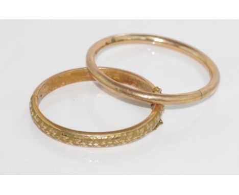 Vintage gold plated hinged bangle with leaf design marked TH Best gold plated inside, together with another gold plated bangl