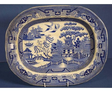 Antique blue & white meat serving plate blue & white Willow pattern. Unmarked, possibly Spode. Length 40cms approx.