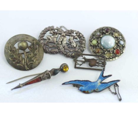 Vintage silver blue bird brooch together with a hallmarked Scottish dirk and four other brooches including deer (two as inspe