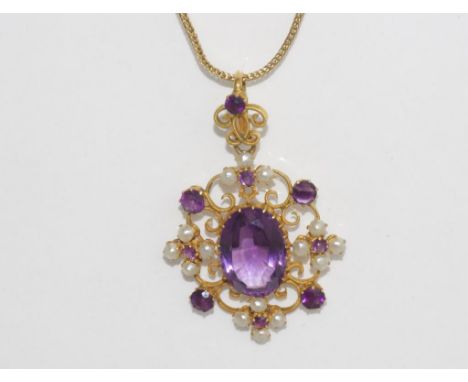 Edwardian 9ct gold, amethyst & seed pearl pendant on a fine 18ct gold chain (pendant and chain tested). Total weight 7.5gms