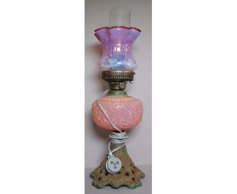 Antique American kerosene table lamp with glass reservoir and vaseline ruby glass shade, converted to electricity, 50cm high 