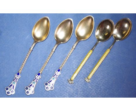 Three gilded silver Norwegian teaspoons enamel decorated finials; together with 2 other enamel decorated gilded teaspoons, ma