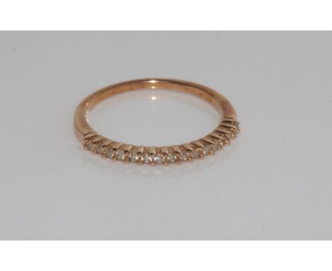 Rose gold and diamond stacker ring marked 9K stamped 0.17 inside (TDW), weight: approx 1.5 grams, size: O/7