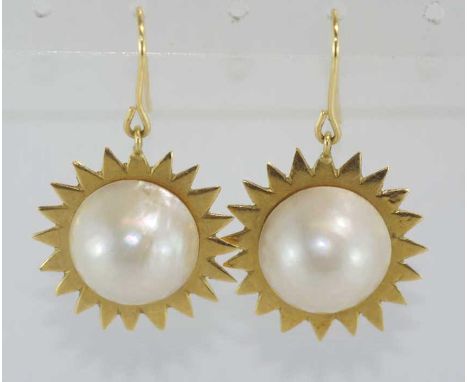 18ct yellow gold and mabe pearl earrings with sunburst shape behind