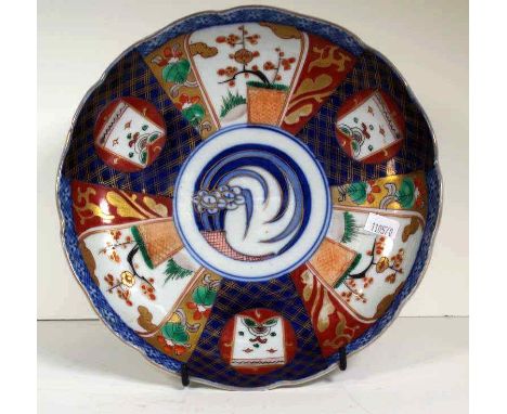 Vintage Japanese imari shallow bowl traditional decoration in sections to bowl, marked to base. Diameter 22.5cm approx.