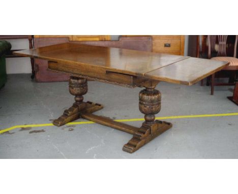 Vintage oak drawer leaf extension table with ornately carved pedestal ends, circa 1950s, 212cm long (137cm not extended), 81c