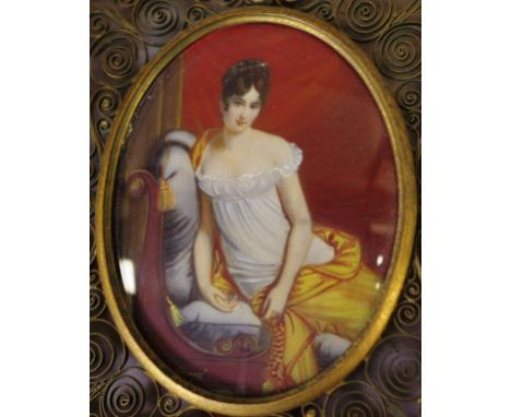 Hand painted portrait miniature of a lady in a fine filigree frame, signed, 15cm x 13cm (frame) approx.