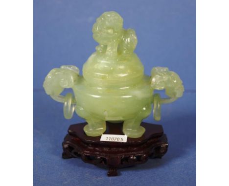 Chinese carved green stone lidded bowl carved foo dog finial to lid, with carved foo dog ring handles. Quad footed. On carved