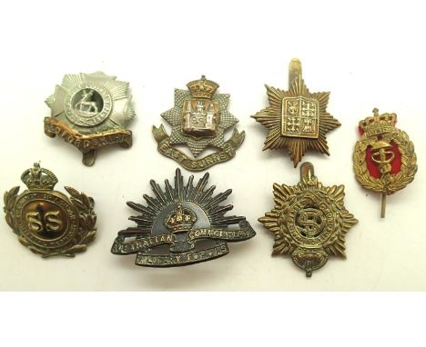 Six WWII British cap badges and an Australian Commonwealth Military Forces cap badge. P&amp;P Group 1 (£14+VAT for the first 