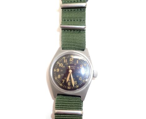 Vietnam made USMC manual wind wristwatch with black dial, working at time of lotting. P&amp;P Group 1 (£14+VAT for the first 