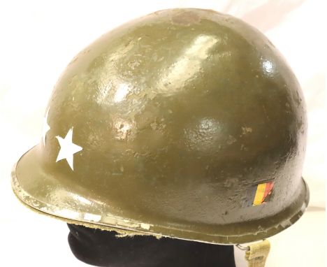 American WWII GI issue olive green helmet with fibre liner and straps, possibly post-war, outer helmet with Belgian decal. P&