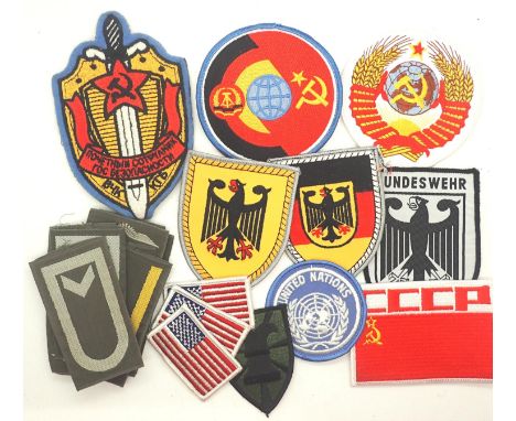 Collection of Cold War fabric patches including Russian and East German. P&amp;P Group 1 (£14+VAT for the first lot and £1+VA