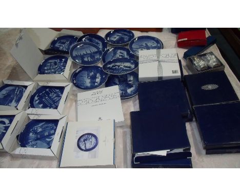 Approx forty Royal Copenhagen collectors plates, Royal Worcester cheese knife and Bing & Grondahl dish
