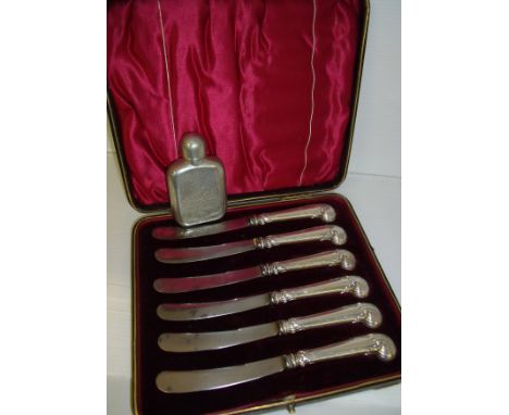 Cased set of butter knives with pistol grip handles and a spirit flask from Selangor OCBC Bank 