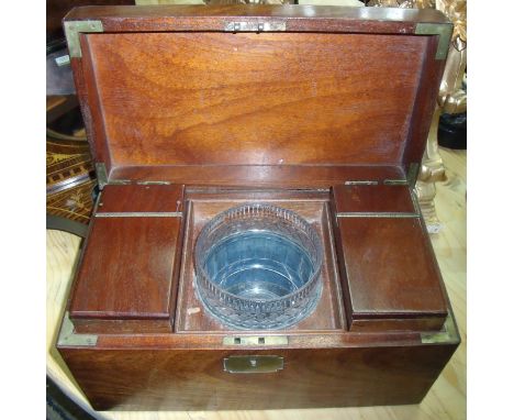 19th C mahogany tea caddy with inset brass handle with two lift out compartments and central glass mixing bowl 