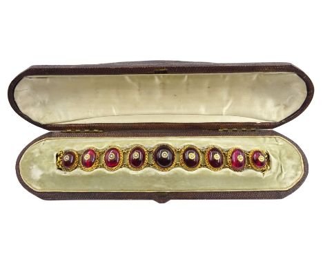 Victorian gold garnet and pearl bracelet, nine graduating cabochon garnets in a foil back setting, each set with a seed pearl