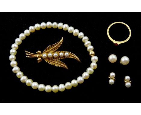 Two pairs of gold pearl stud earrings, gold pearl leaf brooch, gold pink stone set ring, all 9ct hallmarked or tested and a p