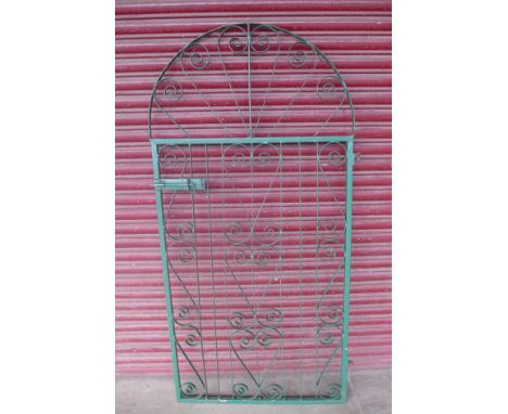 A painted steel garden gate 