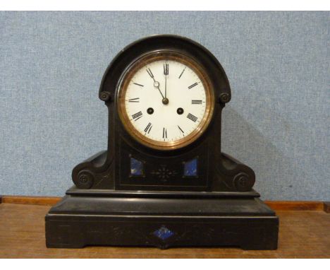 A 19th Century French Belge noir mantel clock 