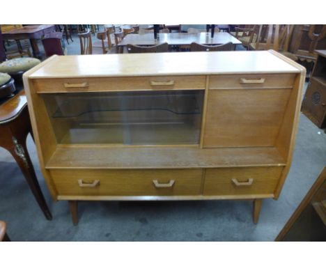 A G-Plan Brandon light oak highboard and two bookcases 