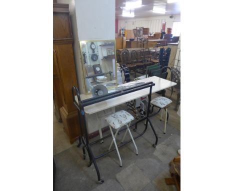 A tubular steel machinist's table and stand, an anglepoise lamp, stools and a mirror 