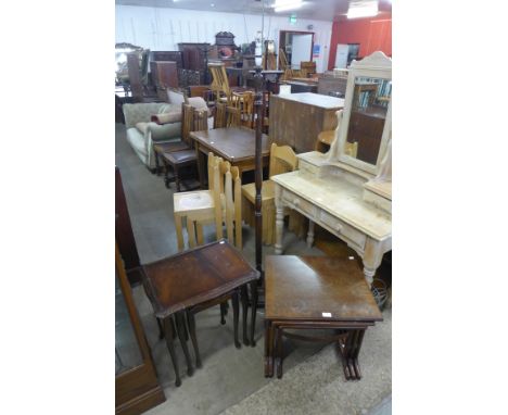 Two mahogany nests of tables and a standard lamp 