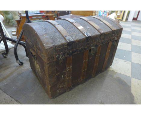 A Victorian dome topped steamer trunk 