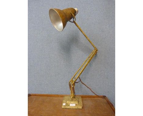 A Herbert Terry mottled green metal anglepoise desk lamp 