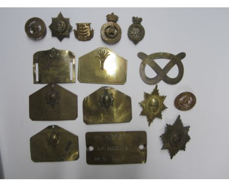 British Military Insignia,Good quality examples comprising seven brass bed plates, four to the Worcestershire Regiment all na