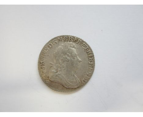 George I,Shilling, 1723, first laureate and draped bust right, R.Crowned cruciform Shields SSC in angles (S.3647).  Extremely
