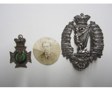 A small collection of items to Major H.H.Stuart, Royal Irish Rifles,comprising a Victorian cross belt badge of the Royal Iris