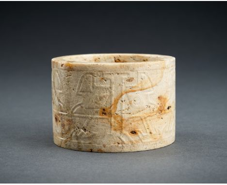 AN ARCHAISTIC JADE CONG, QING DYNASTY OR EARLIERChina, Qing Dynasty (1644-1912) or earlier. Carved in the style of the Liangz