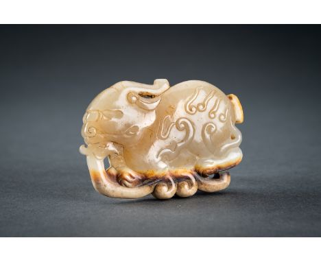 AN ARCHAISTIC PALE CELADON JADE PENDANT OF A QILIN, QINGChina, Qing dynasty (1644-1912) or slightly later. Crafted in the sty