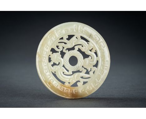 AN ARCHAISTIC YELLOW JADE RETICULATED 'CHILONG' BI DISC, QINGChina, Qing Dynasty (1644-1912) or slightly later. Executed thro