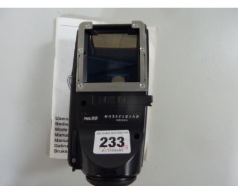 A HASSELBLAD PME90 PRISM VIEWFINDER, serial No. 412EU2265, with manual