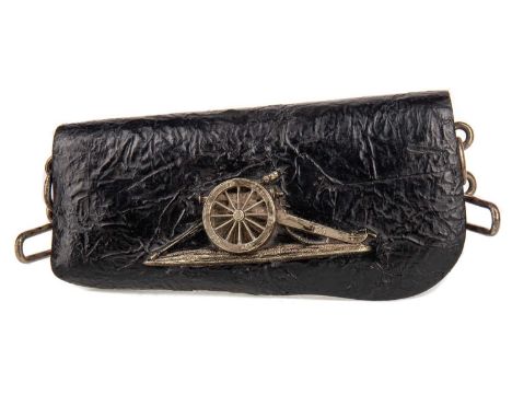 19TH CENTURY ARTILLERY OFFICER'S AMMUNITION POUCH,formed in leather with applied white metal field gun, 18cm wide 