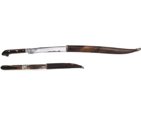 GRADUATED PAIR OF LATE 19TH/EARLY 20TH CENTURY PERSIAN KARD DAGGERS,each with chromed blade, engraved scroll devices, two-pie