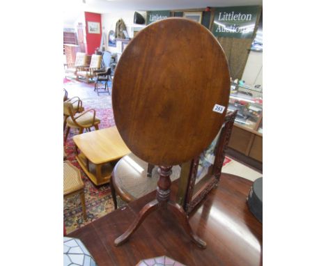 Early mahogany oval tripod table