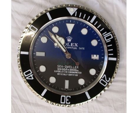 Rolex advertising clock with sweeping hand.This clock is approx 34cm wide overall